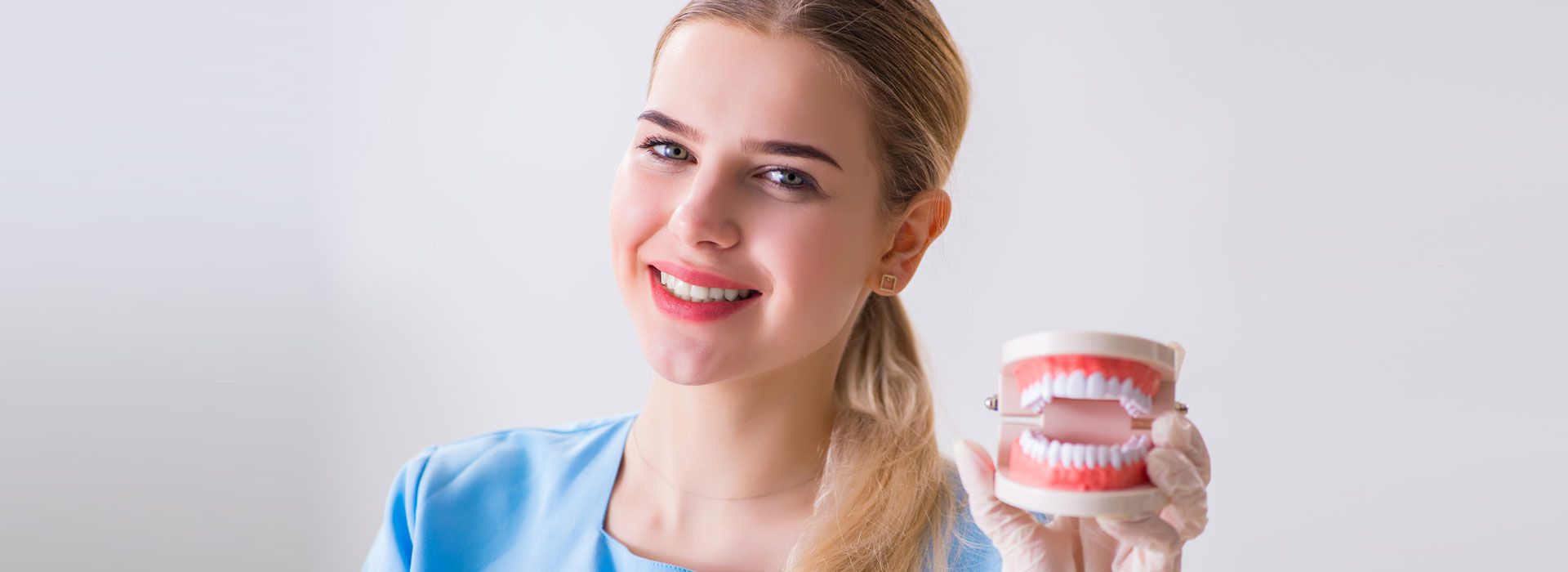 Smiling Girl having the Denture