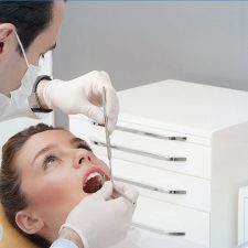 Dentist treating the patient