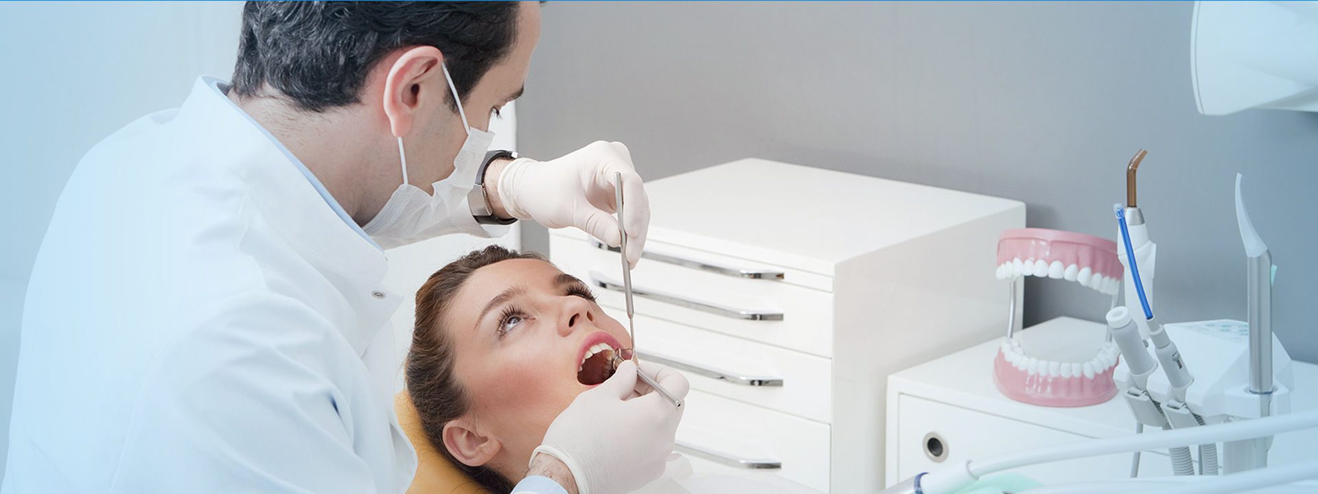 Dentist treating the patient