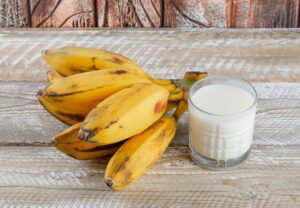 Banana and milk placed together for a healthy snack