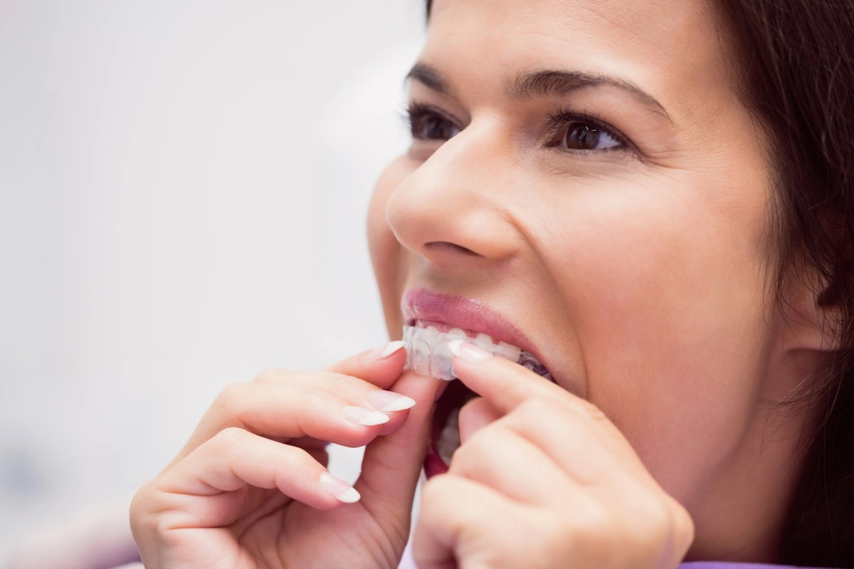 Female patient wearing braces at dentist in Sydney during routine checkup