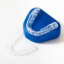 Dental implants in Sydney with custom whitening trays for a brighter smile